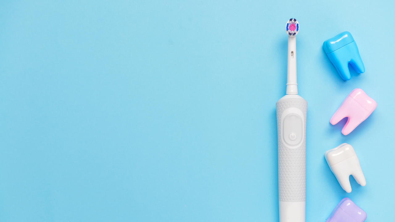 best electric toothbrush against blue background